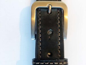 Black belt with brass buckle, leather keeper and hand-stitching